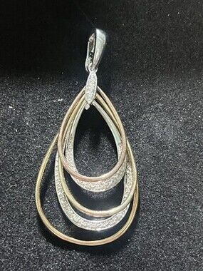 Sterling Silver 2 Tone CZ pave pendant . 5 g,  5 tier tear drops.